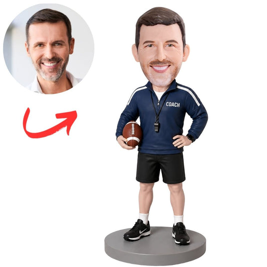 Coach in Navy Pullover Holding Football Custom Bobblehead