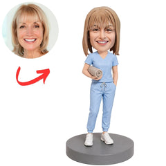 Massage Therapist in Light Blue Scrubs Holding Towel Custom Bobblehead