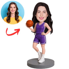 Female Basketball Player in Purple Uniform Holding Ball Custom Bobblehead