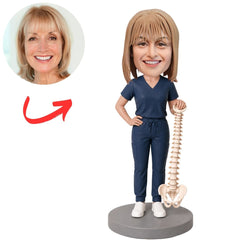 Chiropractor in Navy Scrubs with Spine Model Custom Bobblehead