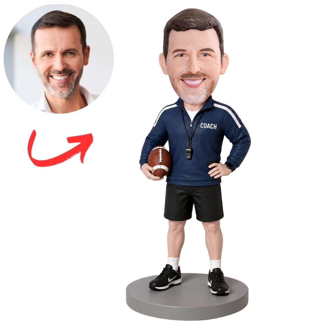 Coach in Navy Pullover Holding Football Custom Bobblehead