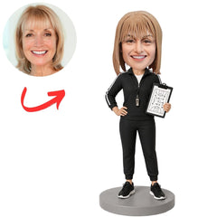 Female Coach in Black Tracksuit Holding Clipboard Custom Bobblehead