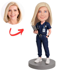 Nurse Practitioner in Navy Scrubs Holding Clipboard Custom Bobblehead