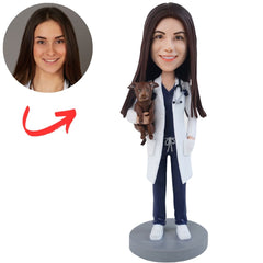 Female Veterinarian in White Coat Holding Dog Custom Bobblehead
